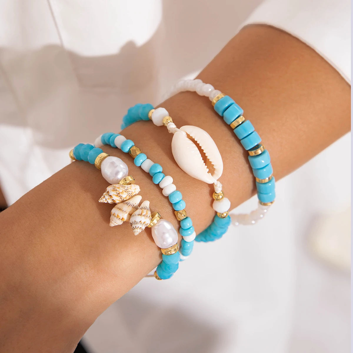 Tocona Bohemian Resort Style Shell Beaded Weaving Bracelet Beach Style Starfish Rice Beads Seven Piece Set for Women
