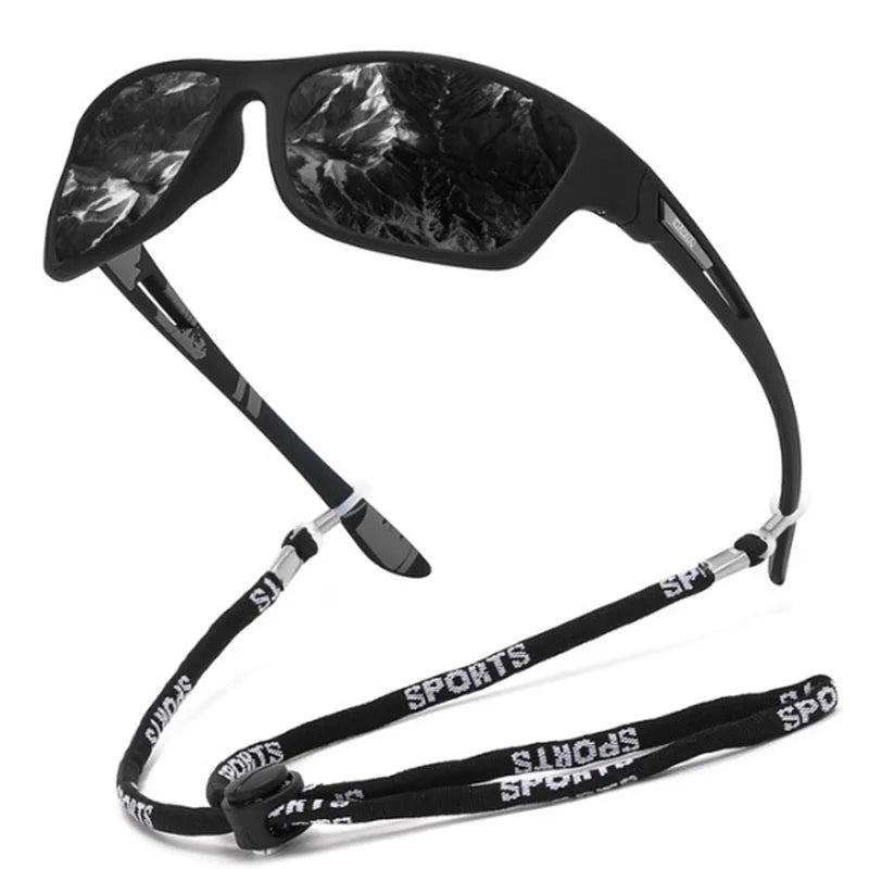 Black sunglasses with a black strap featuring 'SPORTS' text on a white background