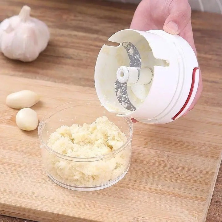 Hand pulled garlic grinder